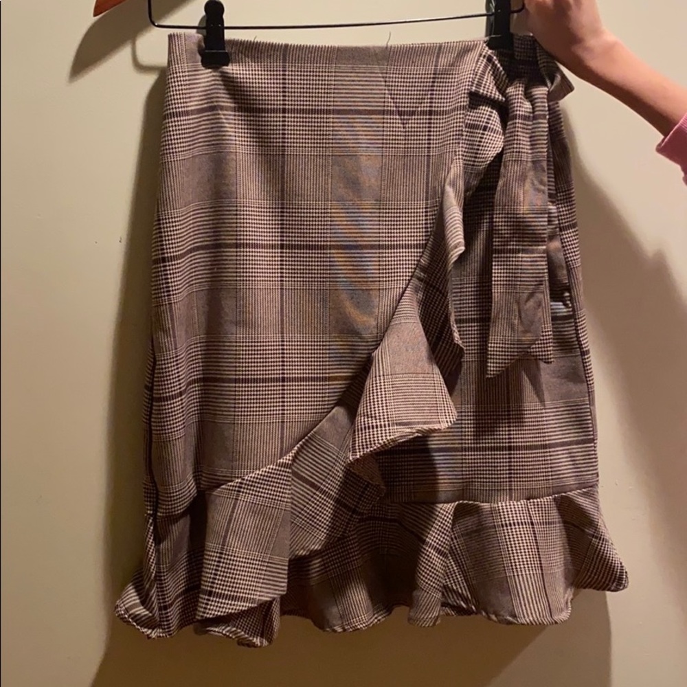 Brown plaid skirt with ruffle detail